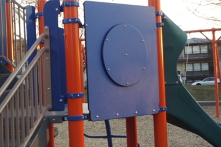 Playground activity panel with a circular cutout.