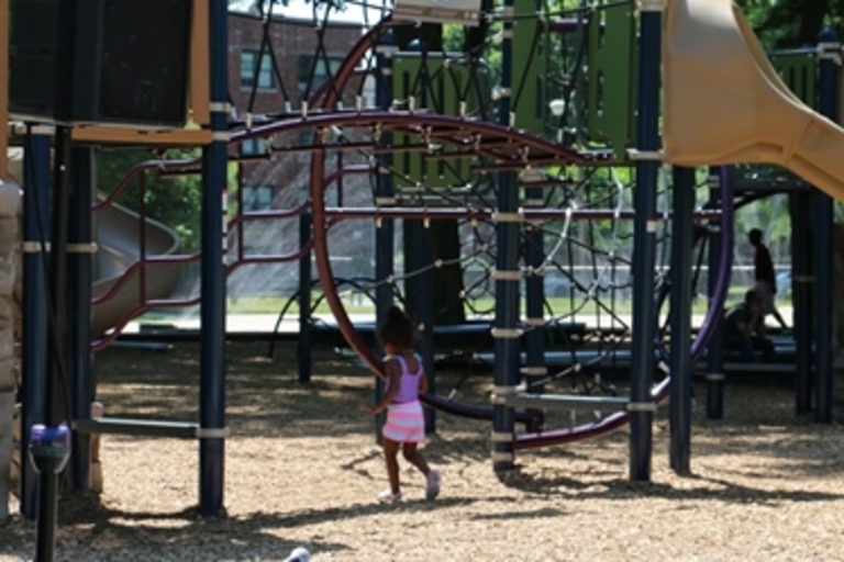 Child playing on a playground.