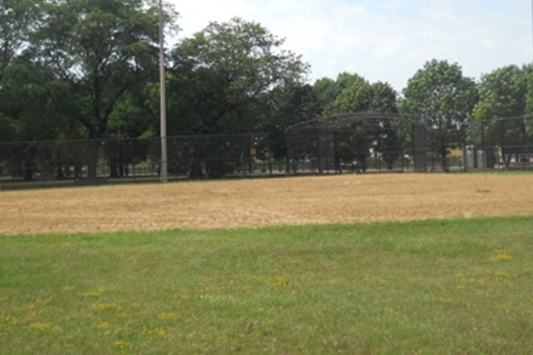 Empty baseball field on a sunny day.