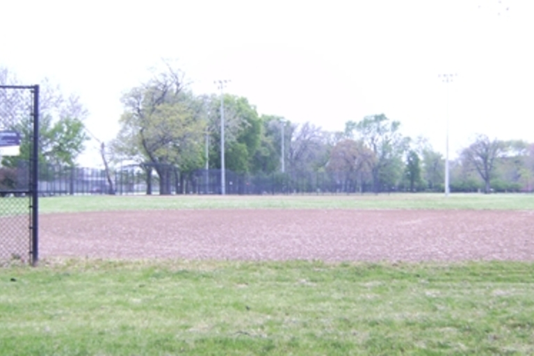 Empty baseball field on an overcast day.