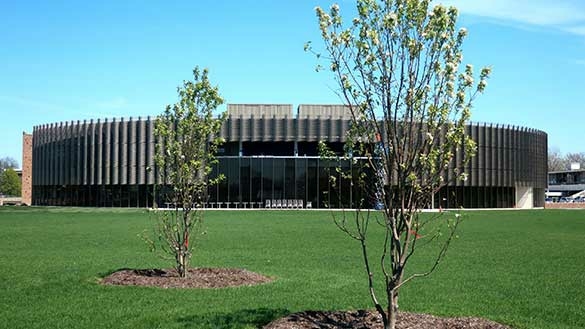 Crowe Hall, Bradley University, circular building with vertical metal facade.