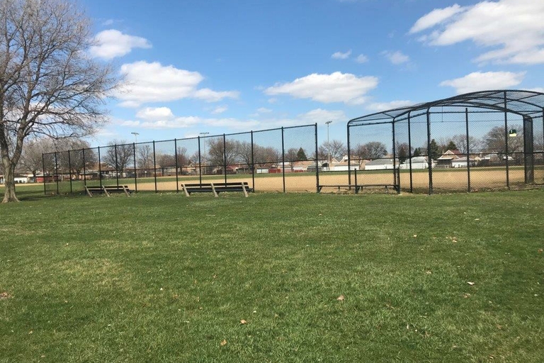 Empty baseball field on a sunny day.