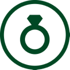 Green ring with diamond-shaped stone.
